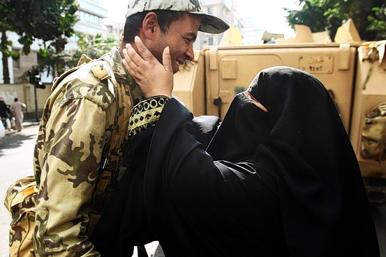 Mother and soldier son at a checkpoint in Cairo, Egypt.  (European Pressphoto Agency)